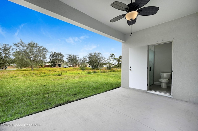 view of patio with ceiling fan
