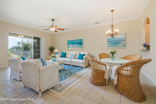 living area with baseboards, visible vents, ornamental molding, and light tile patterned floors
