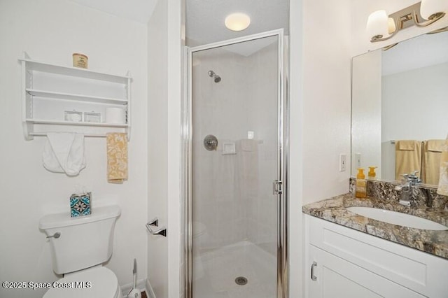 100 Riverside Dr Unit 701, Cocoa, FL 32922 - bathroom with a stall shower, toilet, and vanity