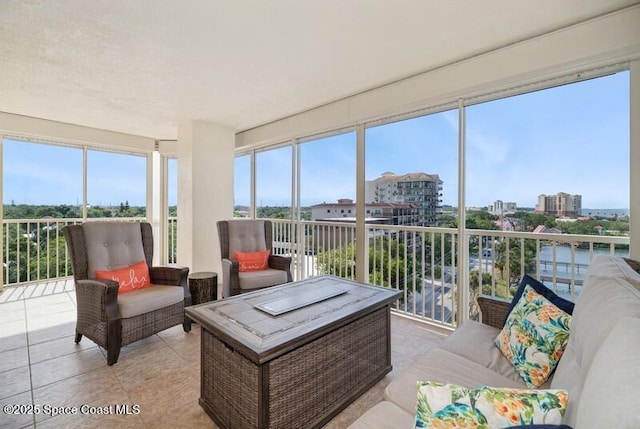 100 Riverside Dr Unit 701, Cocoa, FL 32922 - sunroom featuring tile patterned flooring and a wealth of natural light