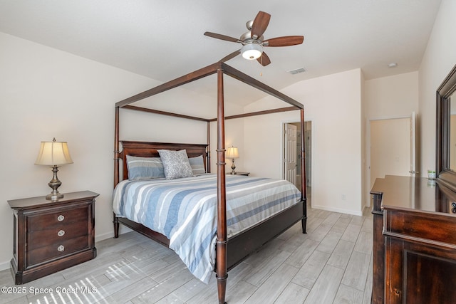 bedroom featuring ceiling fan, baseboards, light wood-type flooring, and visible vents