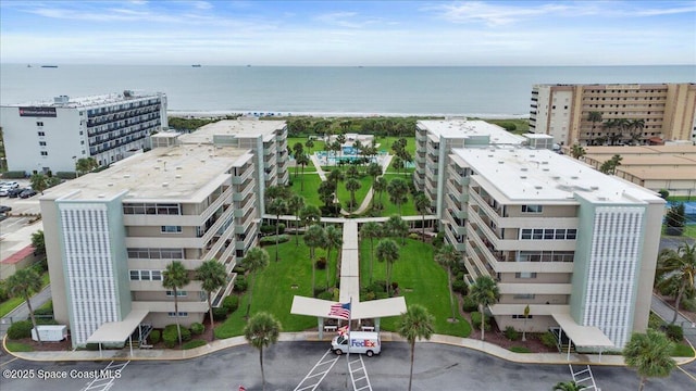 aerial view with a water view and a view of city