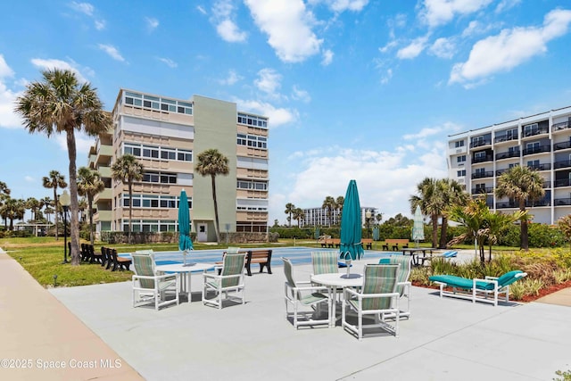 exterior space featuring outdoor dining area and a patio area