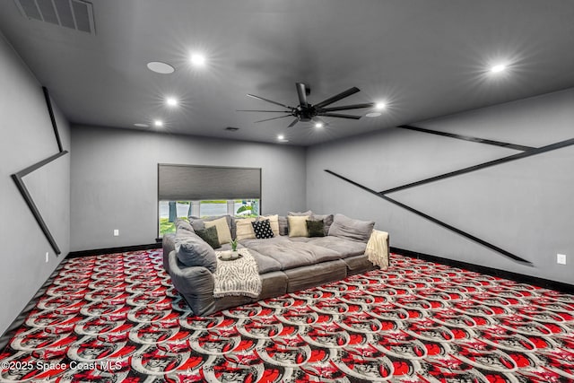 carpeted living room with recessed lighting, a ceiling fan, and baseboards