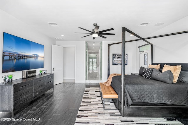 bedroom featuring wood finished floors, baseboards, recessed lighting, and a ceiling fan