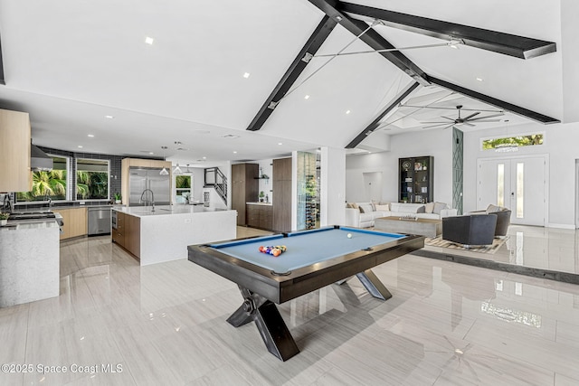 recreation room featuring high vaulted ceiling, billiards table, french doors, beamed ceiling, and a sink