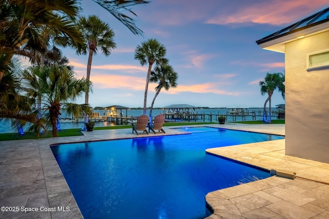 swimming pool with a patio