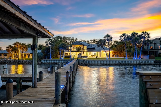 dock area featuring a water view