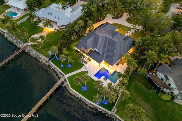 aerial view of property's location with a pool