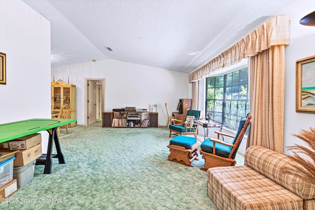 1812 Live Oak Dr N, Rockledge, FL 32955 - interior space featuring visible vents, carpet flooring, a textured ceiling, and lofted ceiling