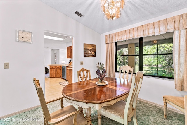 1812 Live Oak Dr N, Rockledge, FL 32955 - dining room featuring visible vents, lofted ceiling, light carpet, baseboards, and a notable chandelier