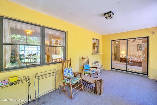 1812 Live Oak Dr N, Rockledge, FL 32955 - living area featuring carpet floors and a ceiling fan