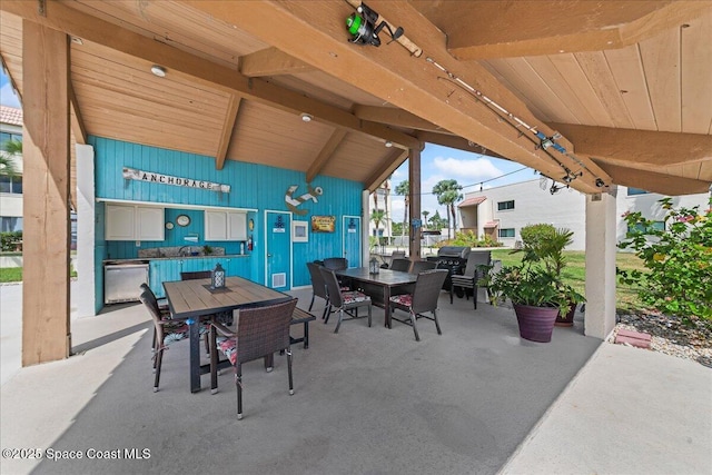 view of patio with outdoor dining area