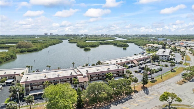 drone / aerial view with a water view