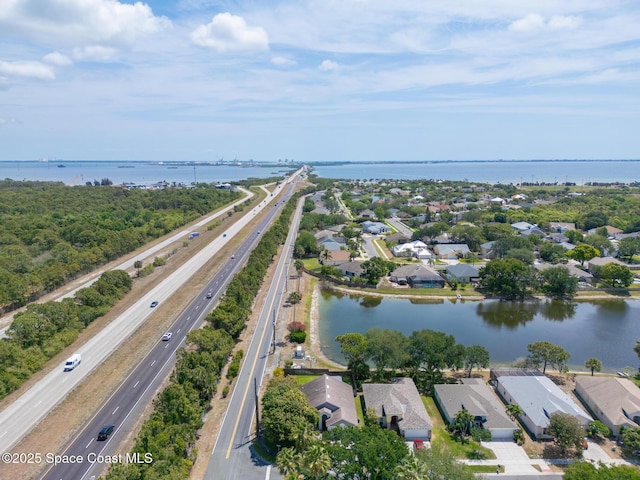 bird's eye view featuring a residential view and a water view