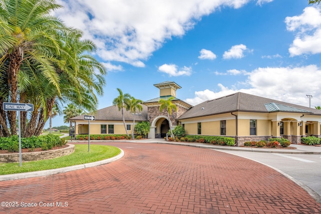 4484 Caladium Cir, West Melbourne, FL 32904 - view of property featuring curved driveway