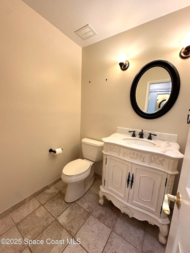304 Emerald Pl E, Indian Harbour Beach, FL 32937 - bathroom with toilet and vanity