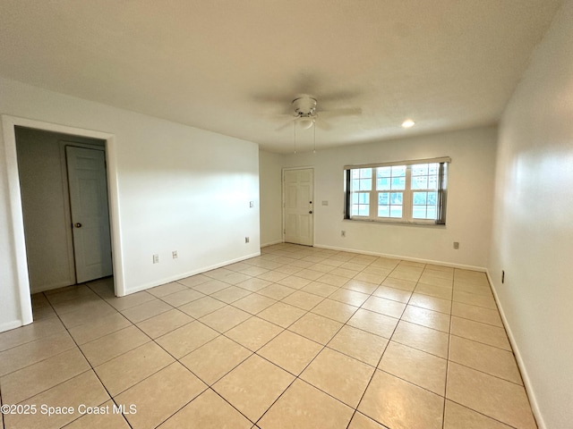 304 Emerald Pl E, Indian Harbour Beach, FL 32937 - unfurnished room with light tile patterned flooring, a ceiling fan, and recessed lighting