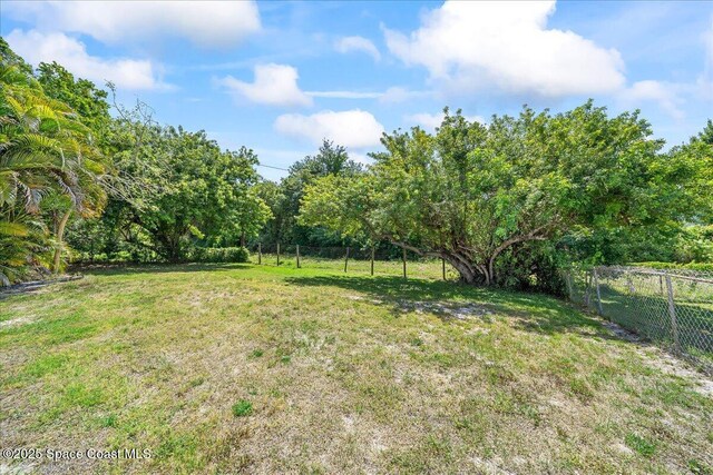 view of yard featuring fence