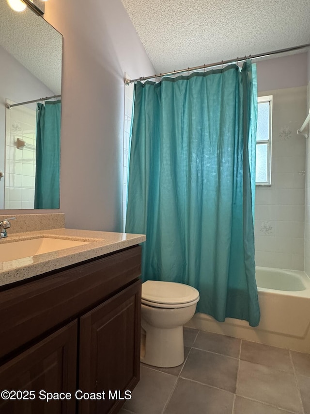 bathroom with a textured ceiling, tile patterned flooring, vanity, toilet, and shower / bath combination with curtain