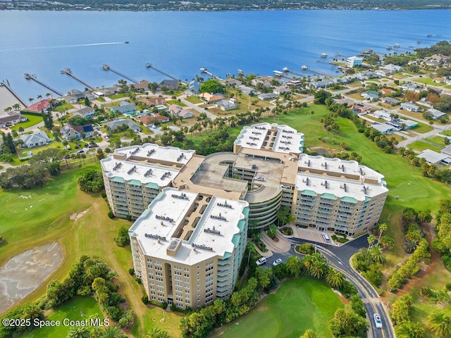 aerial view featuring a water view and view of golf course