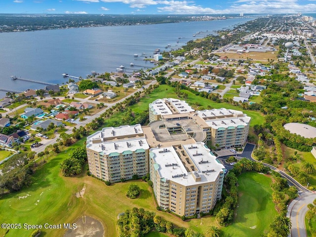 drone / aerial view featuring a water view and view of golf course