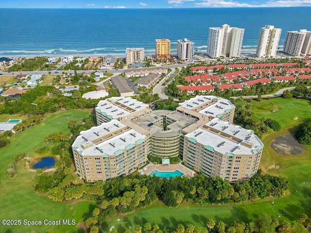 aerial view with a water view and golf course view