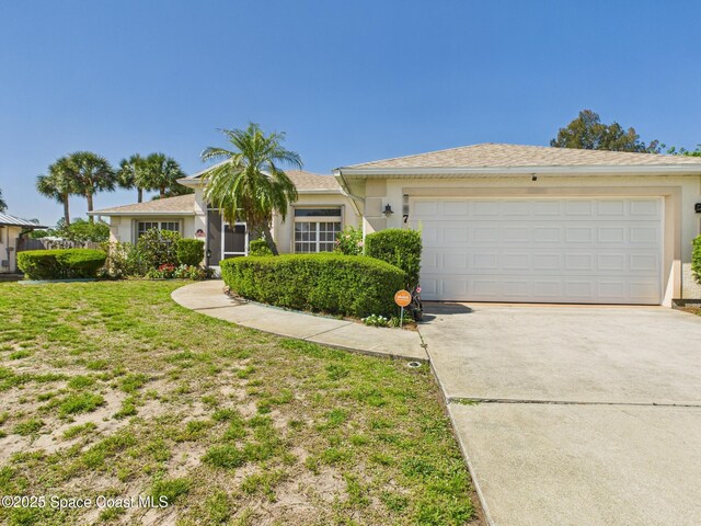 787 Carnation Dr, Sebastian, FL 32958 - single story home featuring concrete driveway, a garage, and stucco siding