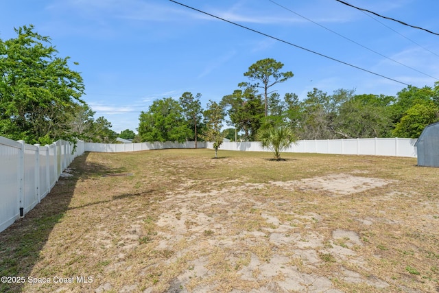 view of yard featuring a fenced backyard