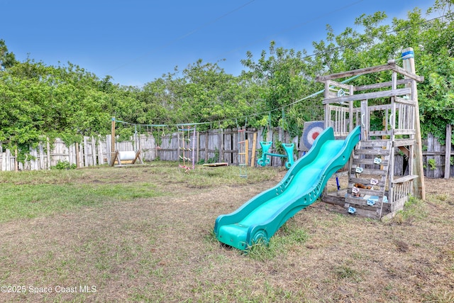 view of play area featuring fence