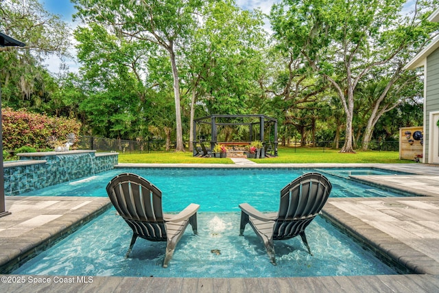 3592 S Park Ave, Titusville, FL 32780 - swimming pool with a gazebo, view of wooded area, and a hot tub