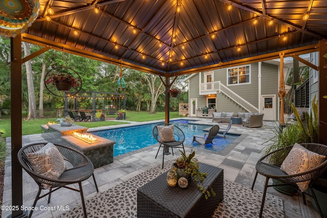 3592 S Park Ave, Titusville, FL 32780 - swimming pool with outdoor lounge area, a gazebo, stairs, and a patio area