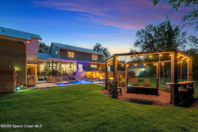3592 S Park Ave, Titusville, FL 32780 - back of property at dusk featuring an outdoor pool, a yard, a patio area, and metal roof