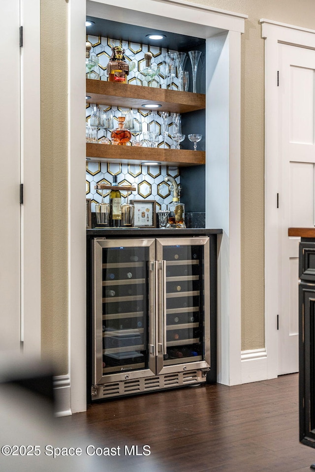 3592 S Park Ave, Titusville, FL 32780 - indoor dry bar with wine cooler and wood finished floors