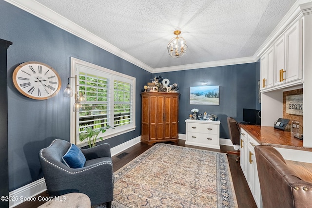 3592 S Park Ave, Titusville, FL 32780 - sitting room with a textured ceiling, dark wood finished floors, crown molding, a chandelier, and baseboards