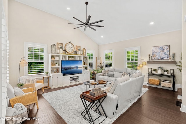 3592 S Park Ave, Titusville, FL 32780 - living area with a ceiling fan, high vaulted ceiling, dark wood-style floors, recessed lighting, and baseboards
