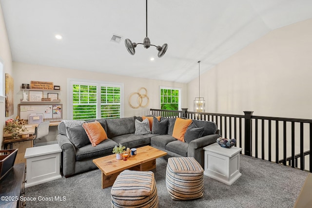 3592 S Park Ave, Titusville, FL 32780 - living room with a chandelier, lofted ceiling, healthy amount of natural light, carpet flooring, and recessed lighting
