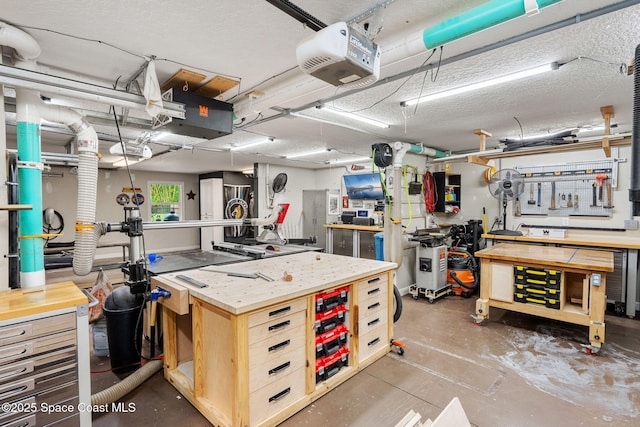 3592 S Park Ave, Titusville, FL 32780 - miscellaneous room with a workshop area and concrete floors