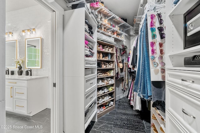 3592 S Park Ave, Titusville, FL 32780 - walk in closet featuring a sink