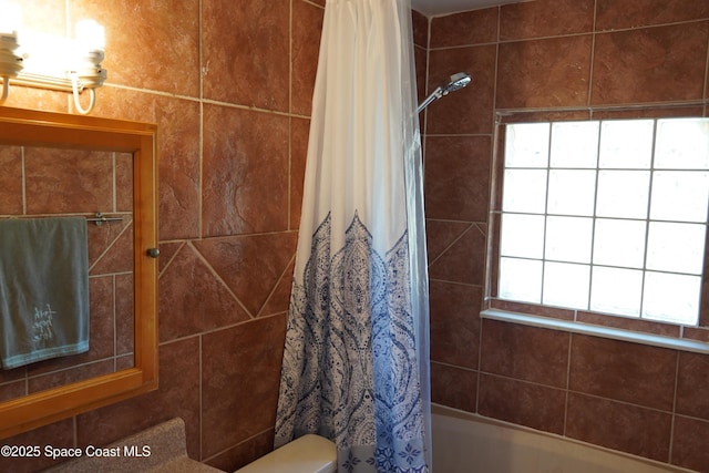 full bath featuring shower / tub combo