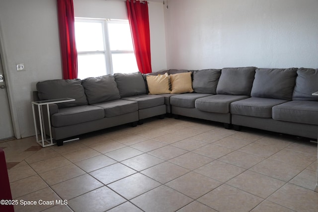 living area featuring light tile patterned floors