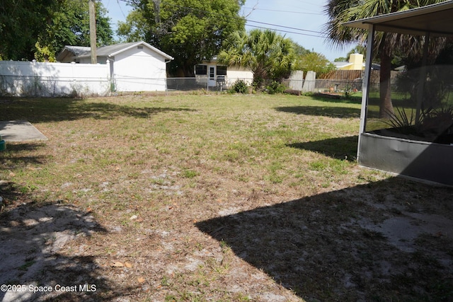 view of yard with fence