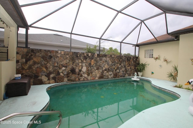swimming pool featuring a lanai