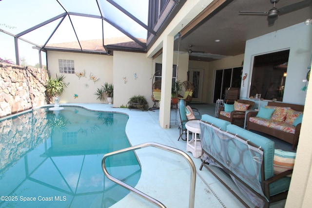 120 Edgewater Way, Merritt Island, FL 32953 - swimming pool with a ceiling fan, an outdoor hangout area, a patio, and glass enclosure