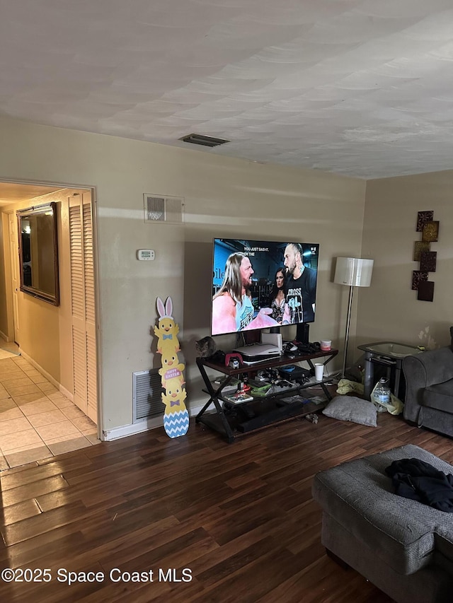 living area with wood finished floors