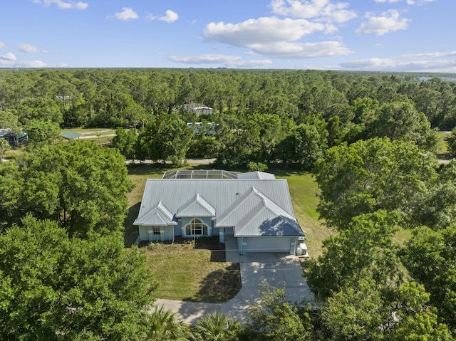 aerial view with a wooded view