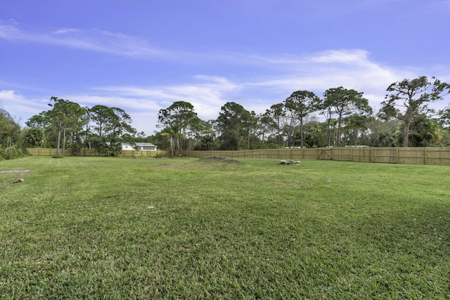 view of yard with fence