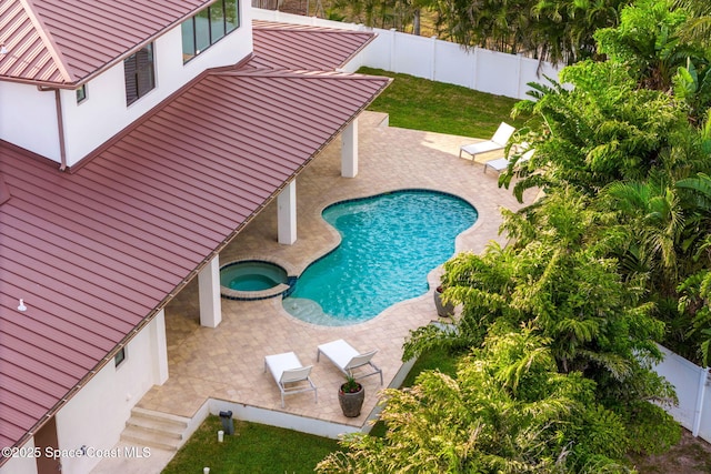 2355 N Riverside Dr, Indialantic, FL 32903 - view of pool with a fenced backyard, a patio area, and a pool with connected hot tub