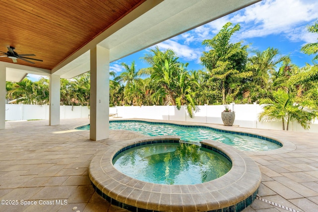 2355 N Riverside Dr, Indialantic, FL 32903 - view of pool featuring a patio, a pool with connected hot tub, a ceiling fan, and a fenced backyard
