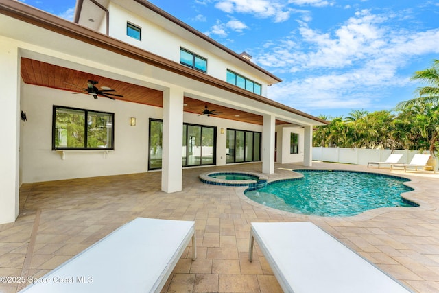 2355 N Riverside Dr, Indialantic, FL 32903 - view of swimming pool featuring fence, ceiling fan, a pool with connected hot tub, and a patio area